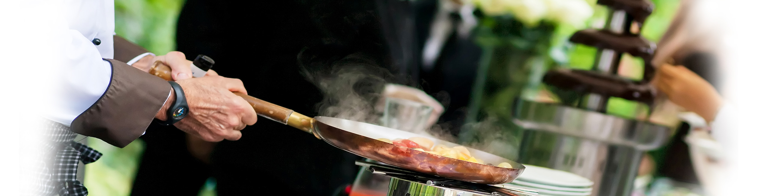 Protect your catering business with comprehensive liability, van and business insurance. Catering banner with hot food sizzling in a frying pan.